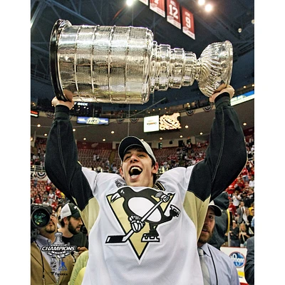 Evgeni Malkin Pittsburgh Penguins Unsigned Stanley Cup Champions Raising Photograph