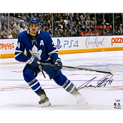 Auston Matthews Toronto Maple Leafs Autographed 16" x 20" Blue Jersey Stopping Photograph