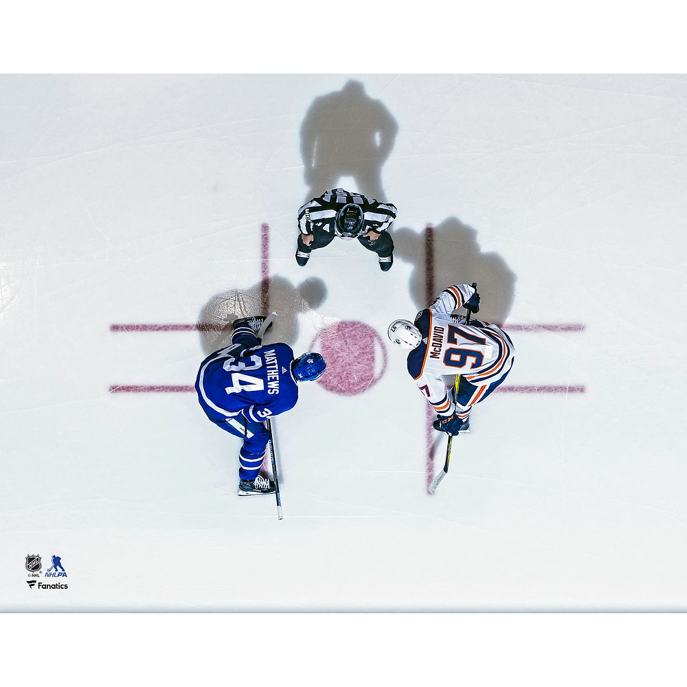 Connor McDavid Edmonton Oilers Unsigned Face-Off vs. Auston Matthews Photograph