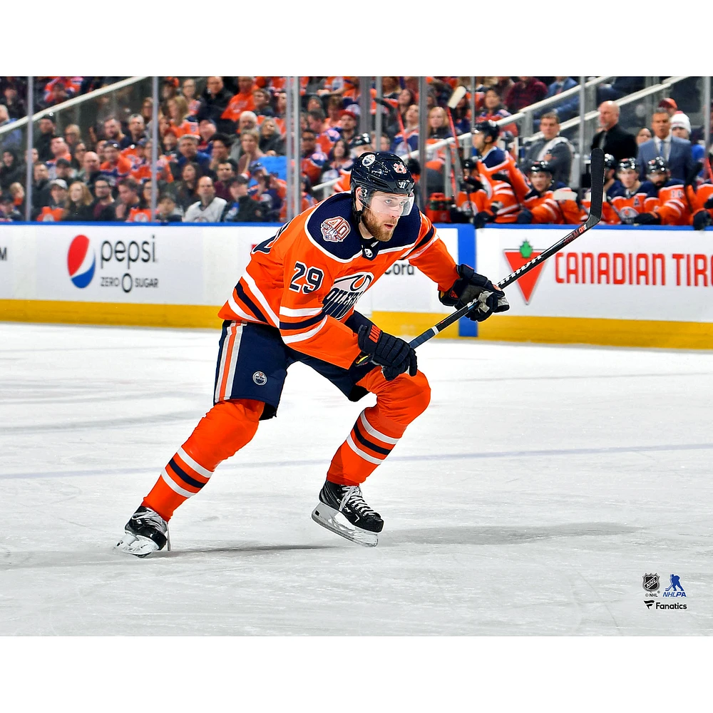 Leon Draisaitl Edmonton Oilers Unsigned Orange Jersey Skating Photograph