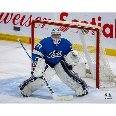 Connor Hellebuyck Winnipeg Jets Unsigned Alternate Jersey Net Photograph