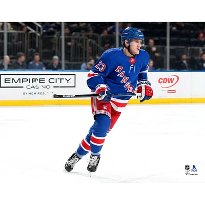 Adam Fox New York Rangers Unsigned Blue Jersey Skating Photograph