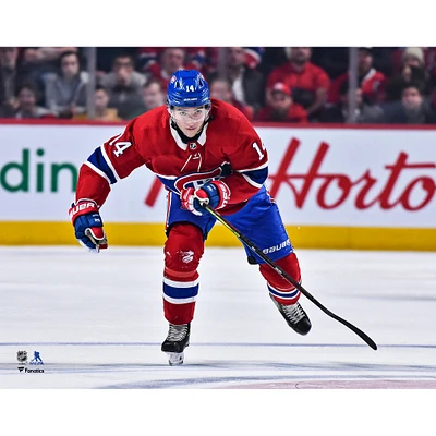 Nick Suzuki Montreal Canadiens Unsigned Red Jersey Skating Photograph