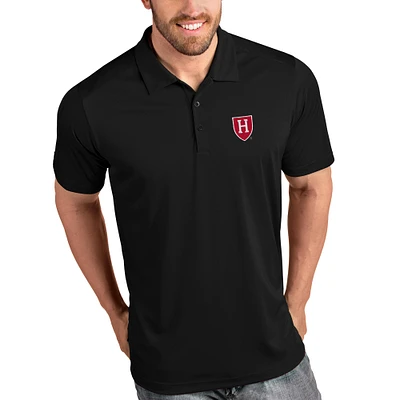 Men's Antigua Black Harvard Crimson Tribute Polo