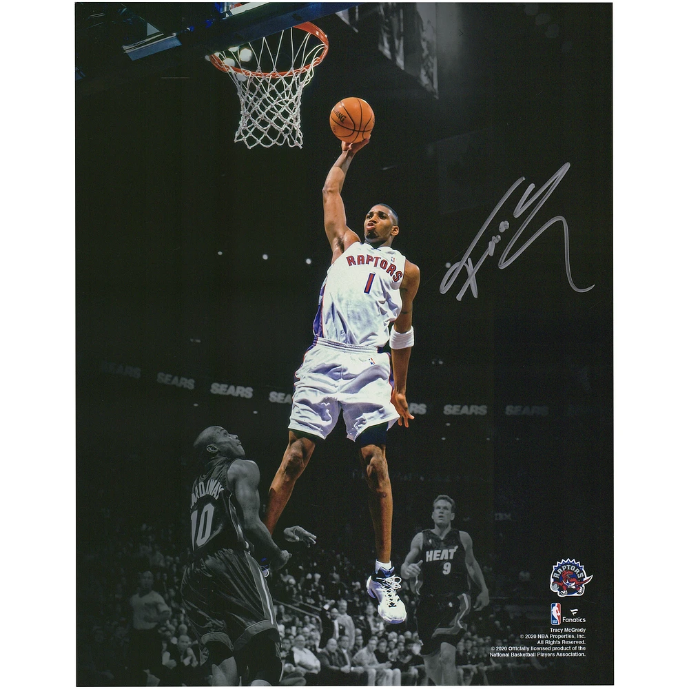 Tracy McGrady Toronto Raptors Autographed 11" x 14" Spotlight Dunk vs. Miami Heat Photograph