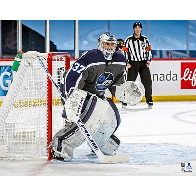 Connor Hellebuyck Winnipeg Jets Unsigned Reverse Retro Jersey Net Photograph