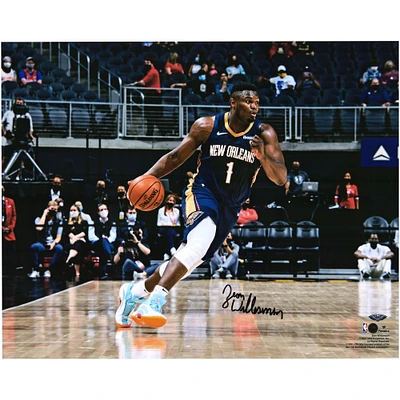 Zion Williamson New Orleans Pelicans Autographed 16" x 20" Dribbling in Navy Jersey Photograph
