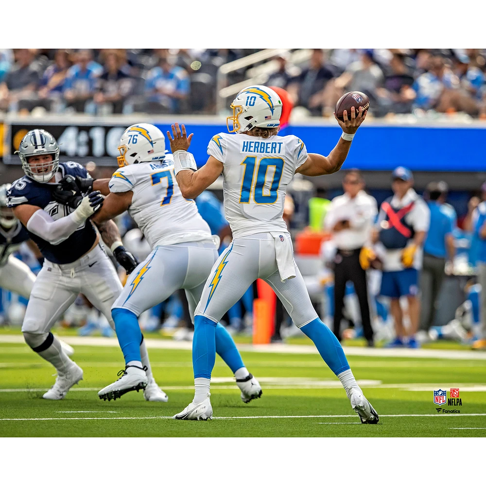 Los Angeles Chargers Justin Herbert Unsigned Throwing Pass Vertical Photograph