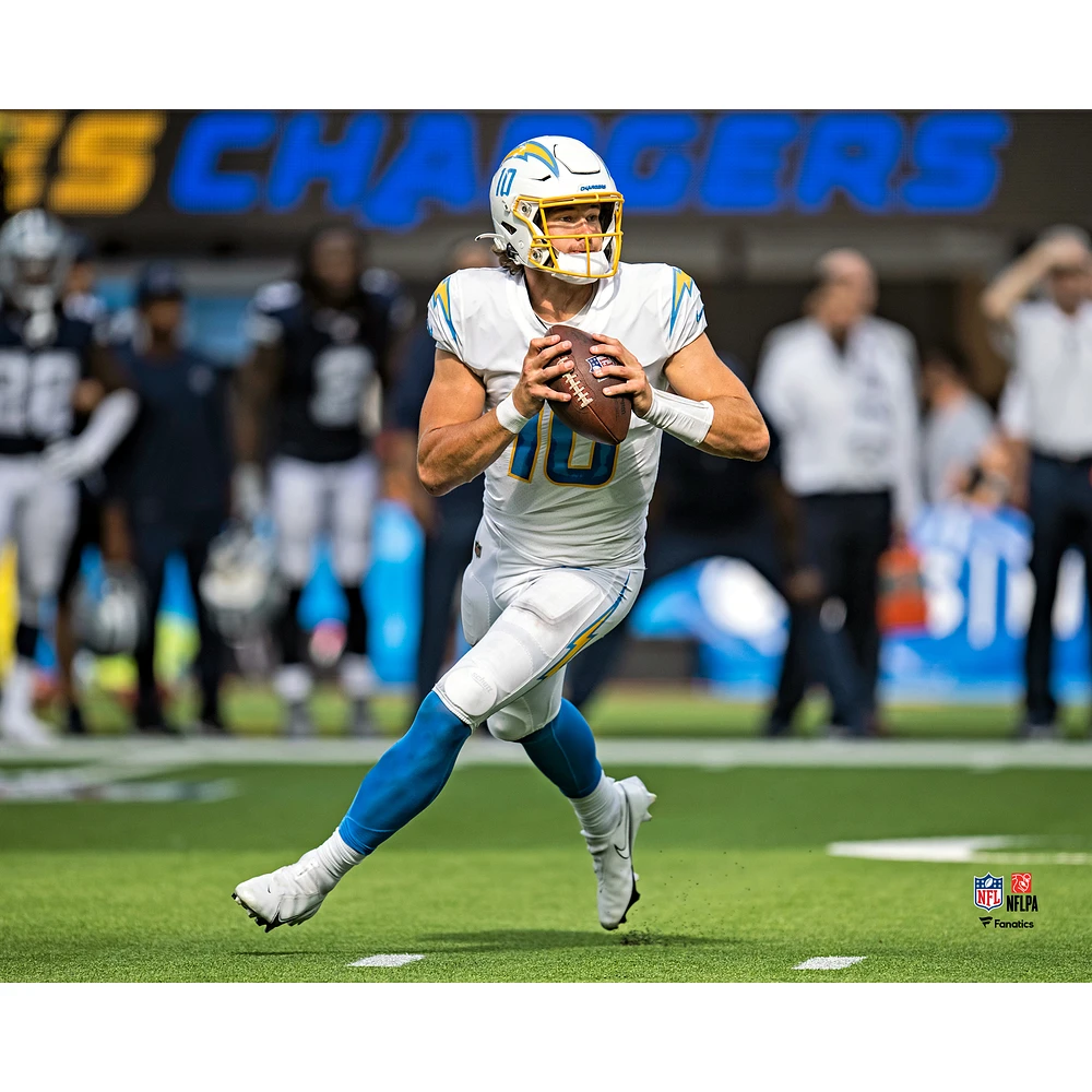 Los Angeles Chargers Justin Herbert Unsigned Looking to Pass Photograph