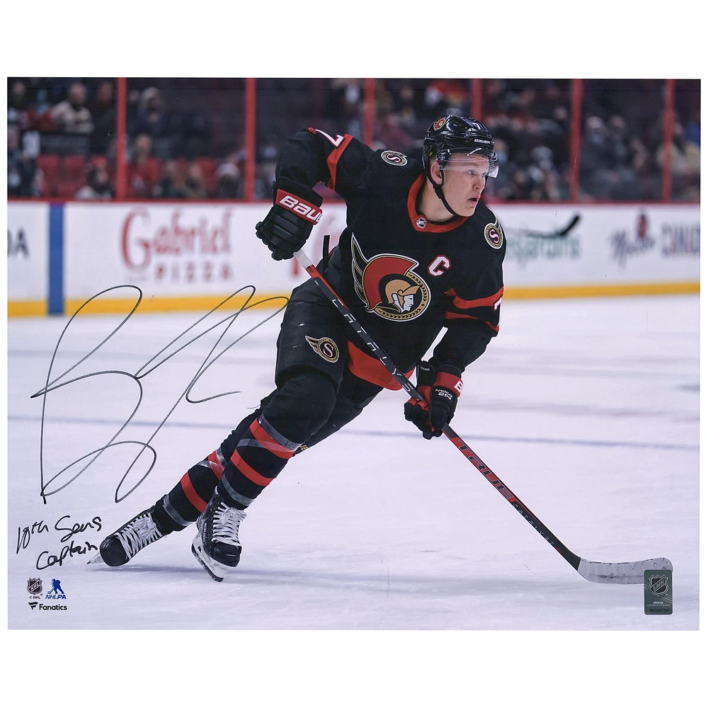 Brady Tkachuk Ottawa Senators Autographed 16'' x 20'' Black Jersey Skating Photograph with ''10th Sens Captain'' Inscription