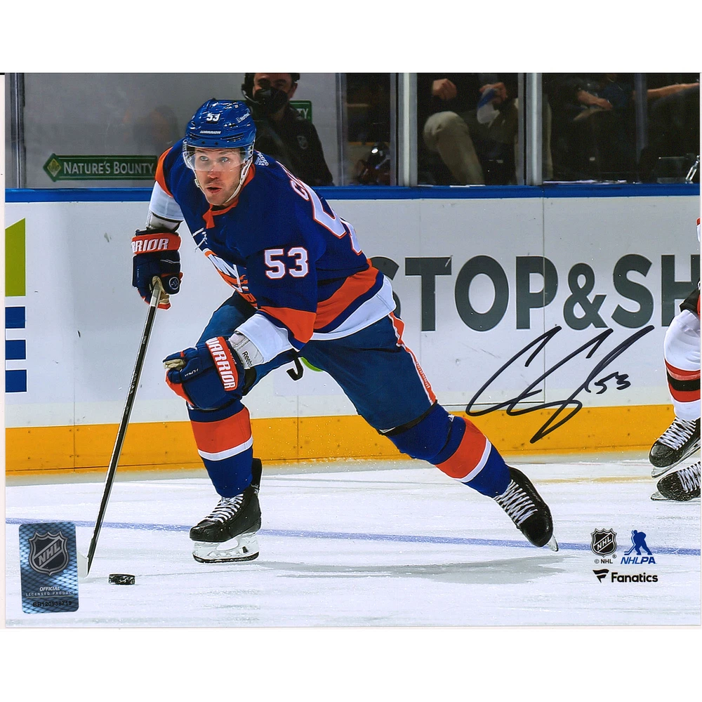 Casey Cizikas New York Islanders Autographed 8" x 10" Royal Jersey Skating with Puck Photograph