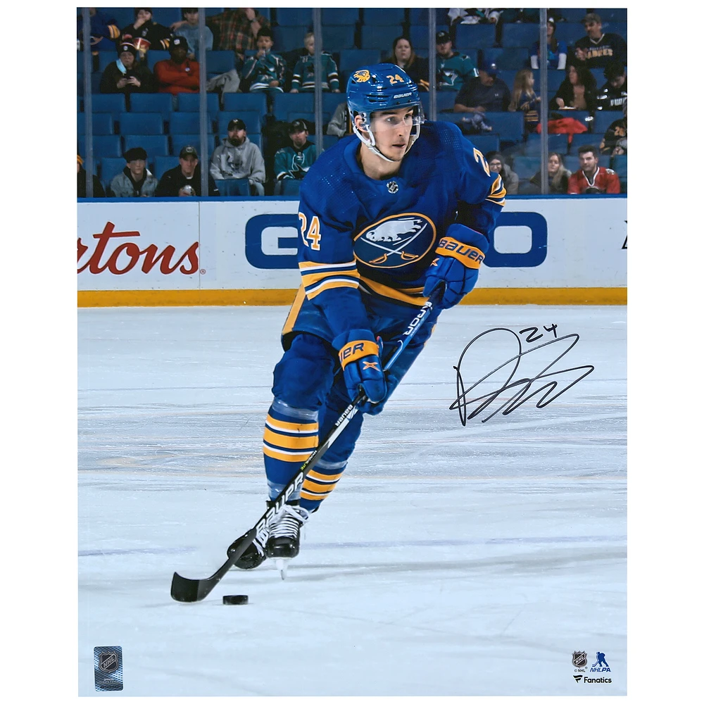Dylan Cozens Buffalo Sabres Autographed 16" x 20" Blue Jersey Skating with Puck Photograph