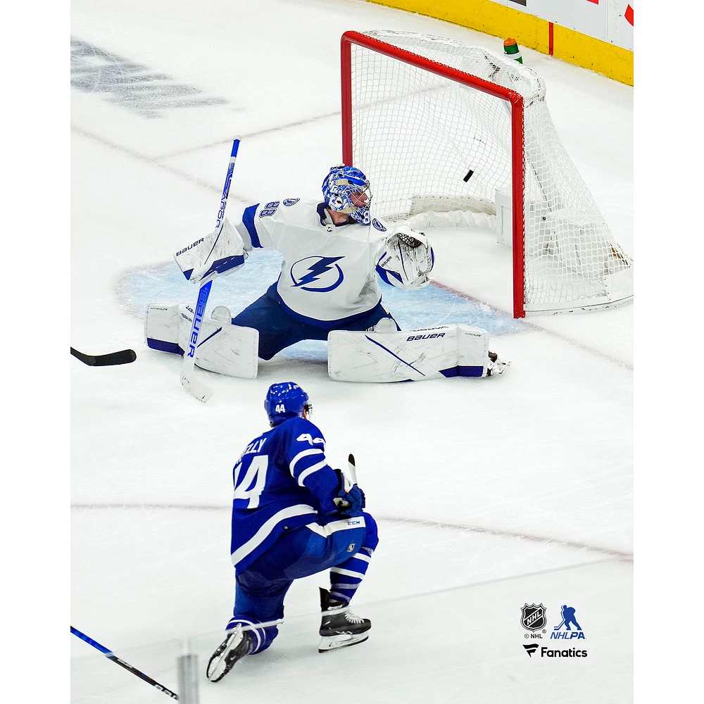 Morgan Rielly Toronto Maple Leafs Unsigned Plays the Puck Photograph