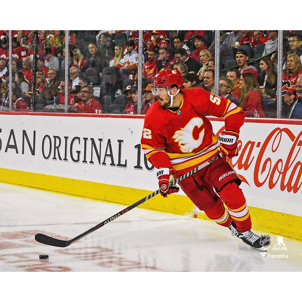 MacKenzie Weegar Calgary Flames Unsigned Carries the Puck Photograph