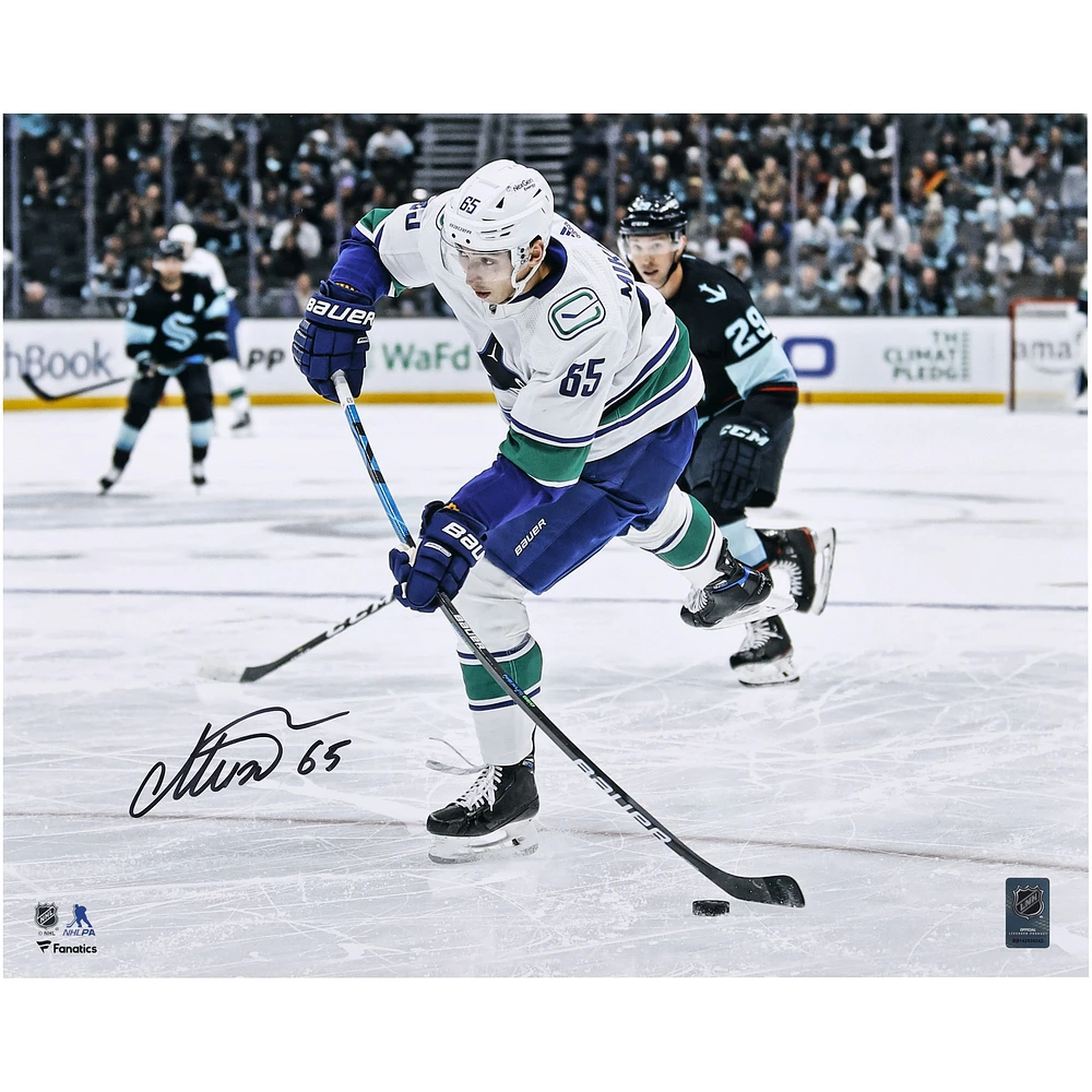 Vancouver Canucks Ilya Mikheyev Autographed 16" x 20" White Jersey Shooting Photograph