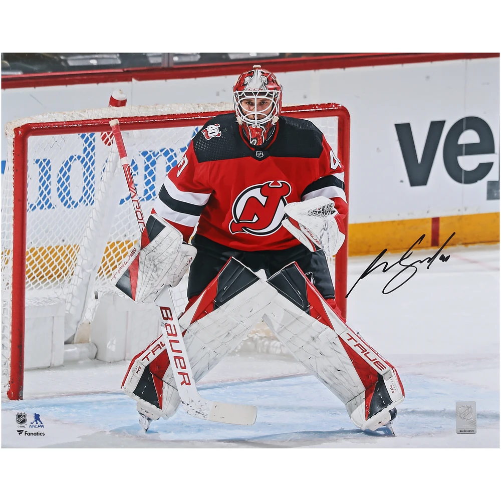 Akira Schmid New Jersey Devils Autographed 16" x 20" Red Jersey in Net Photograph