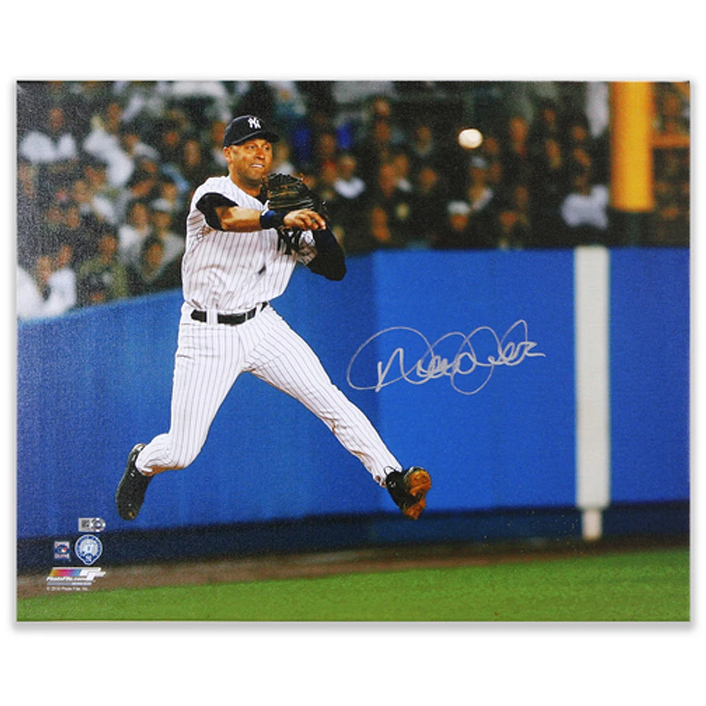 Derek Jeter New York Yankees Autographed 16" x 20" Jump Throw Canvas Photograph