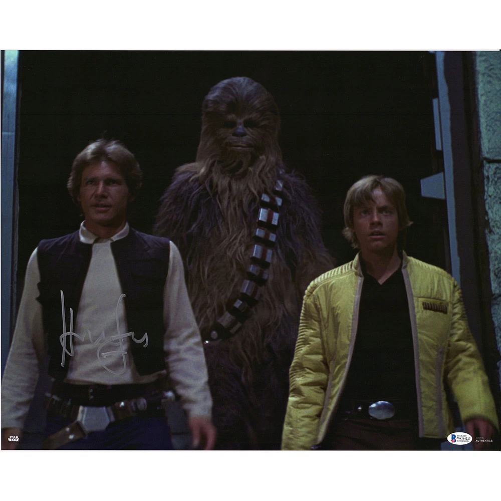 Harrison Ford A New Hope Autographed 16" x 20" Han Solo with Chewbacca & Luke Skywalker Photograph