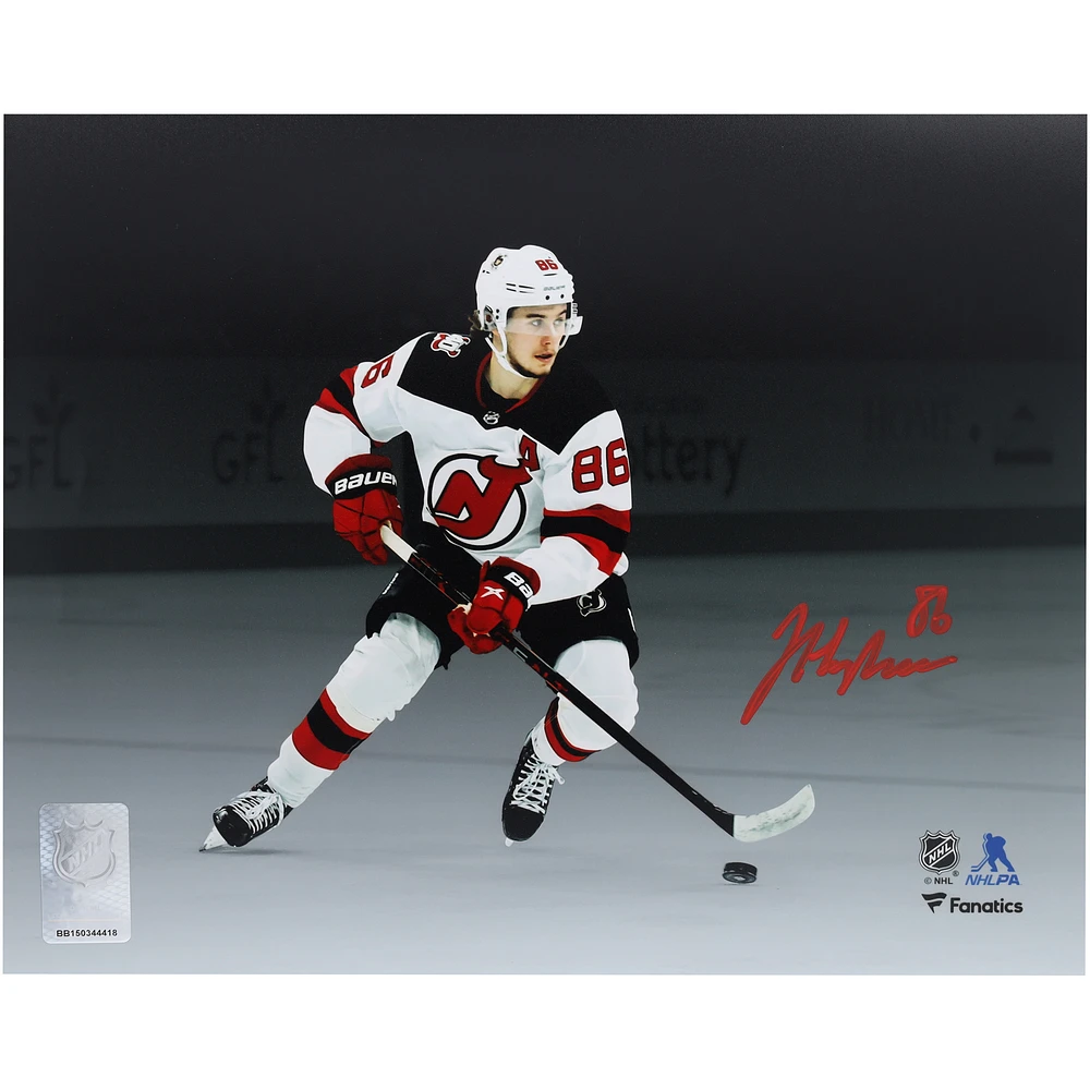 Jack Hughes New Jersey Devils Autographed 8" x 10" White Jersey Skating Spotlight Photograph