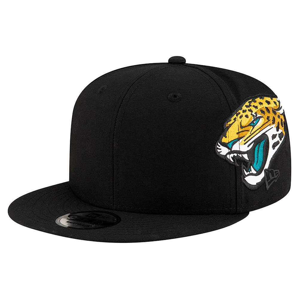 Men's New Era Black Jacksonville Jaguars Helmet 9FIFTY Snapback Hat