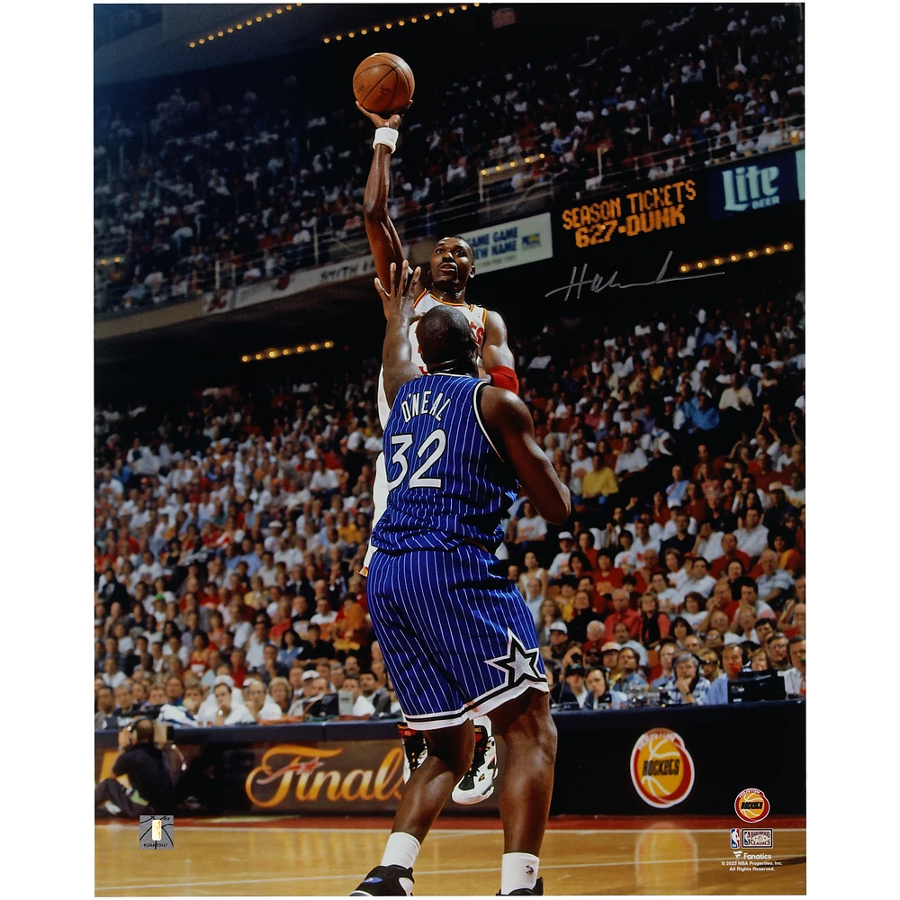 Hakeem Olajuwon Houston Rockets Autographed 16" x 20" Jump Shot Over Shaquille O'Neal Photograph