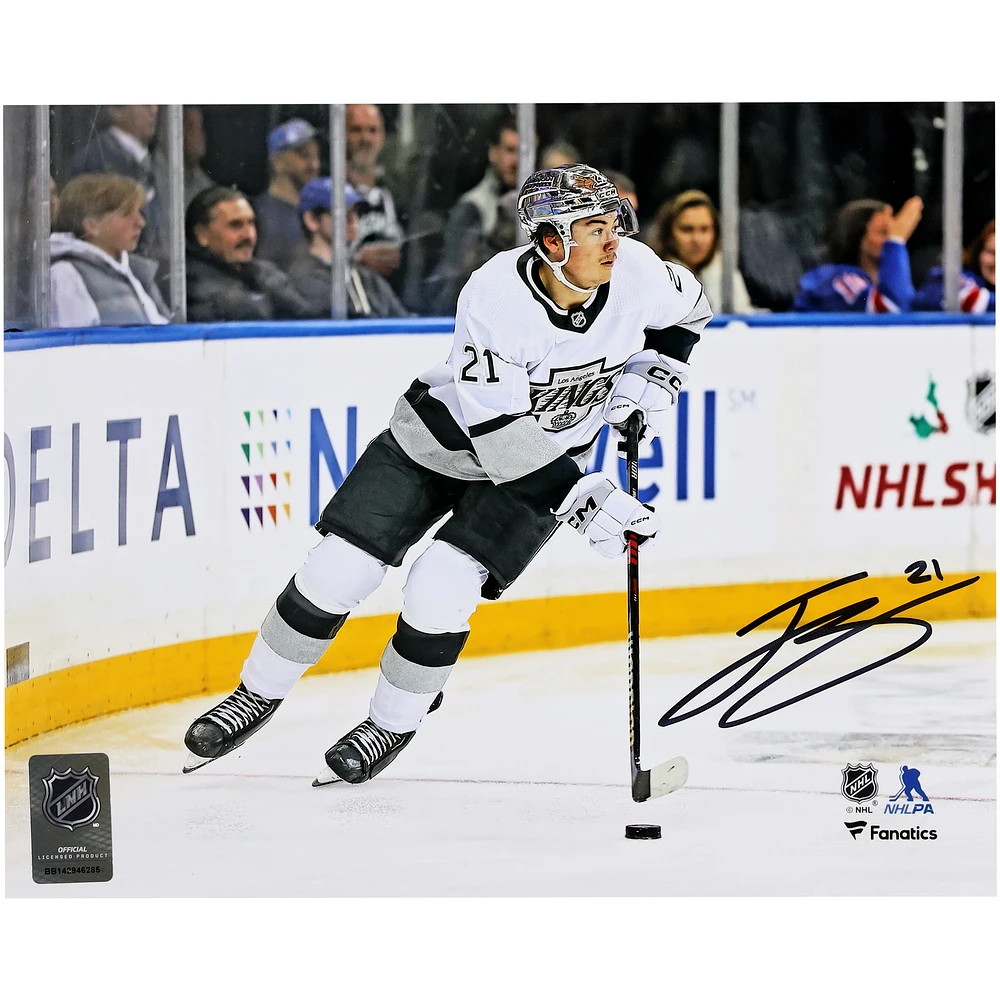 Jordan Spence Los Angeles Kings Autographed 8" x 10" White Jersey with Puck Photograph