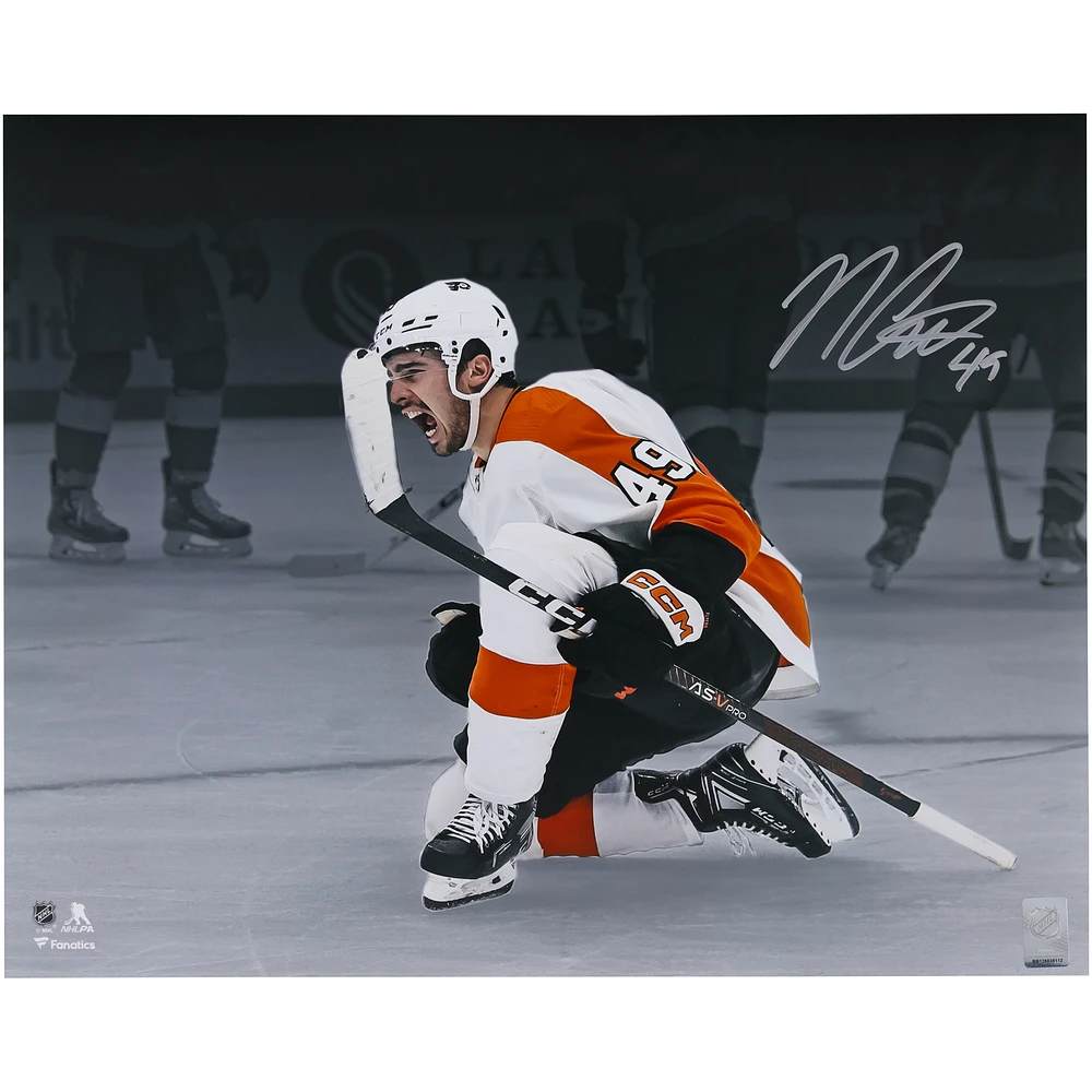 Noah Cates Philadelphia Flyers Autographed 16" x 20" White Jersey Celebrating Spotlight Photograph