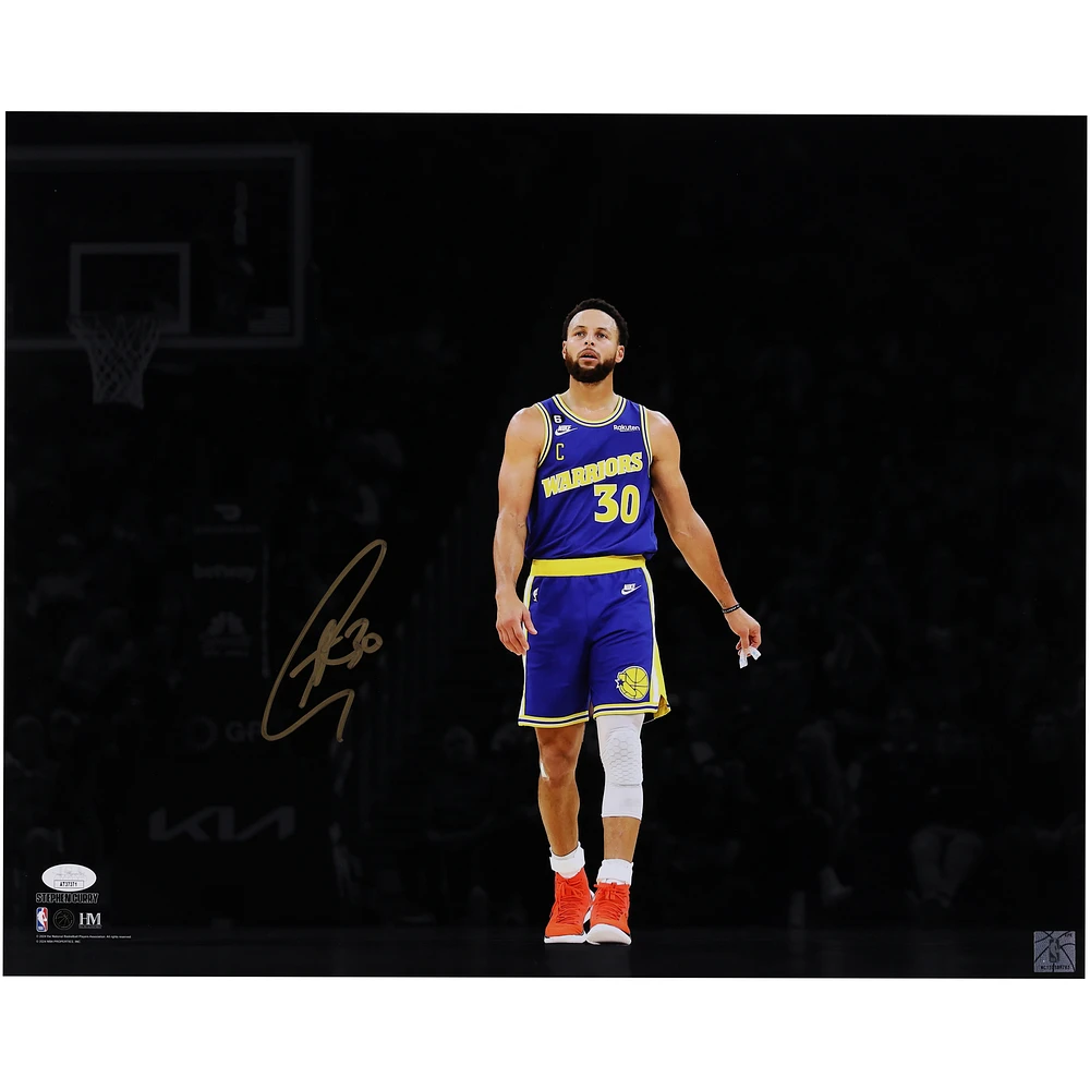 Stephen Curry Golden State Warriors Autographed 16" x 20" Holding Mouth Guard Spotlight Photograph - JSA