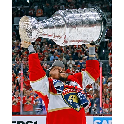 Sam Reinhart Florida Panthers Unsigned 2024 Stanley Cup Champions Raising Photograph