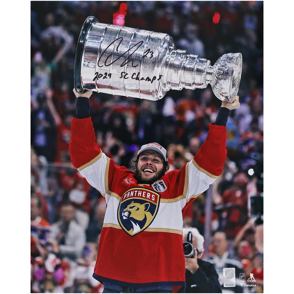 Carter Verhaeghe Florida Panthers Autographed 2024 Stanley Cup Champions 16" x 20" Raising Cup Photograph with "2024 SC Champs" Inscription