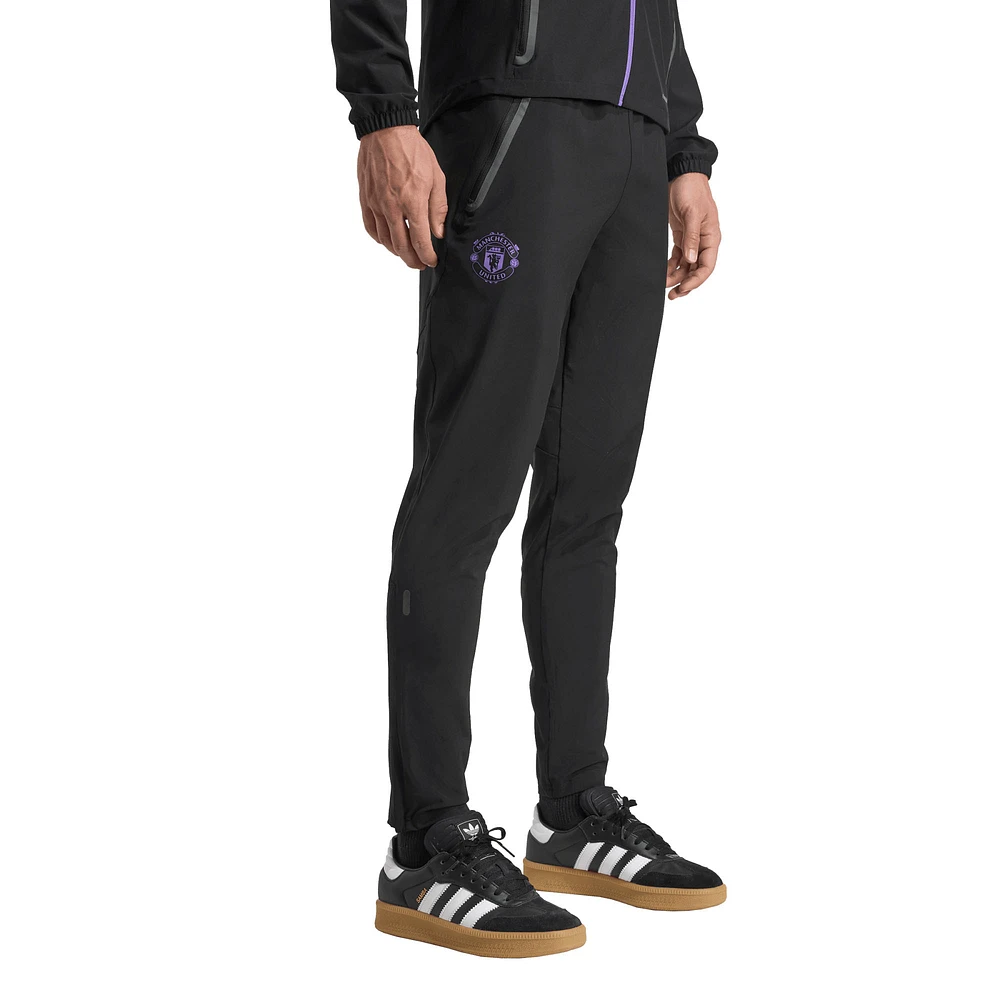 Men's adidas Black Manchester United 2025/26 Tiro Vis Tech AEROREADY Travel Pants