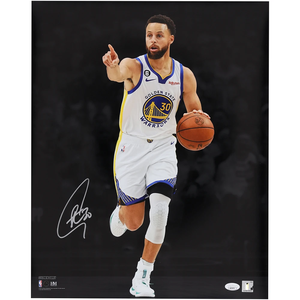 Stephen Curry Golden State Warriors Autographed 16" x 20" Pointing Spotlight Photograph Signed In Silver Ink - JSA