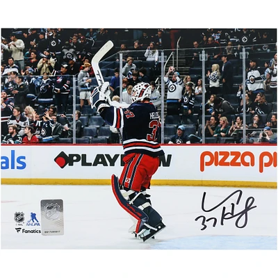 Connor Hellebuyck Winnipeg Jets Autographed 8" x 10" Navy Alternate Jersey Celebration Photograph