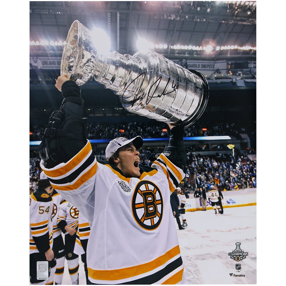 Tuukka Rask Boston Bruins Autographed 16" x 20" 2011 Stanley Cup Champions Raising Cup Photograph