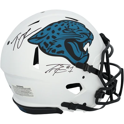 Trevor Lawrence & Travis Etienne Jr. Jacksonville Jaguars Autographed Riddell Lunar Eclipse Speed Authentic Helmet