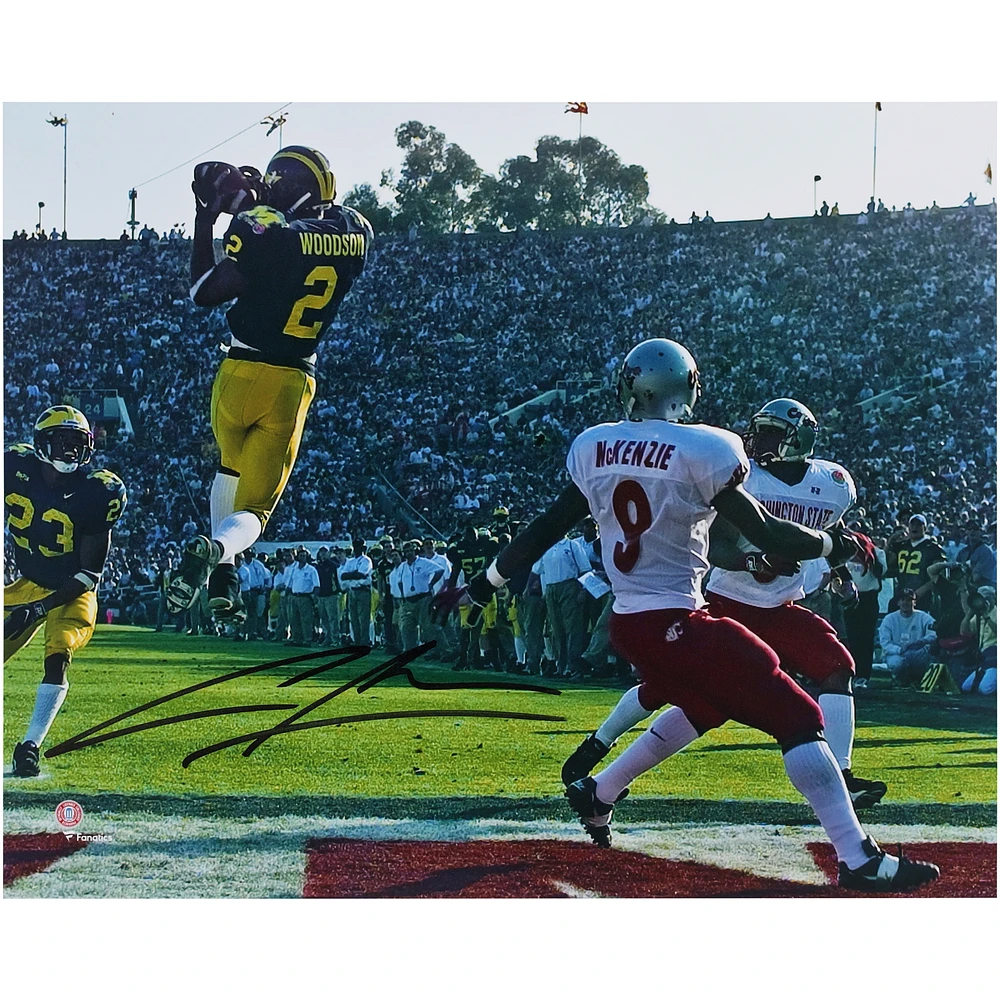 Charles Woodson Michigan Wolverines Autographed 8" x 10" Leaping Interception Photograph