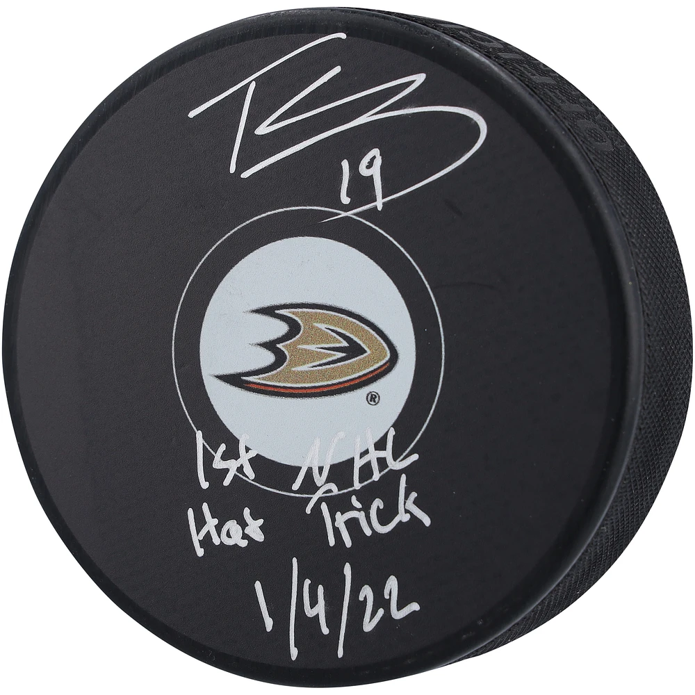 Troy Terry Anaheim Ducks Autographed Hockey Puck with "1st NHL Hat Trick 1/4/22" Inscription
