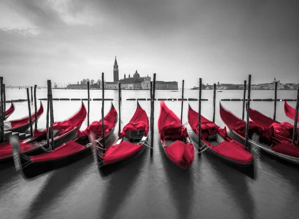Assaf Frank - Bunch of Roses and umbrella on pier with gondolas moored canal, Venice, Italy