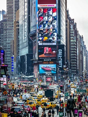 Assaf Frank - Commuters on busy Broadway Ney York City near Times Square
