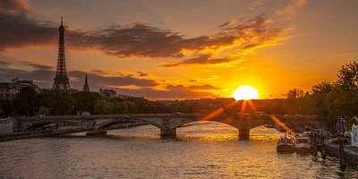 Assaf Frank - View of the Eiffel Tower with a bridge foreground during sunset, Paris