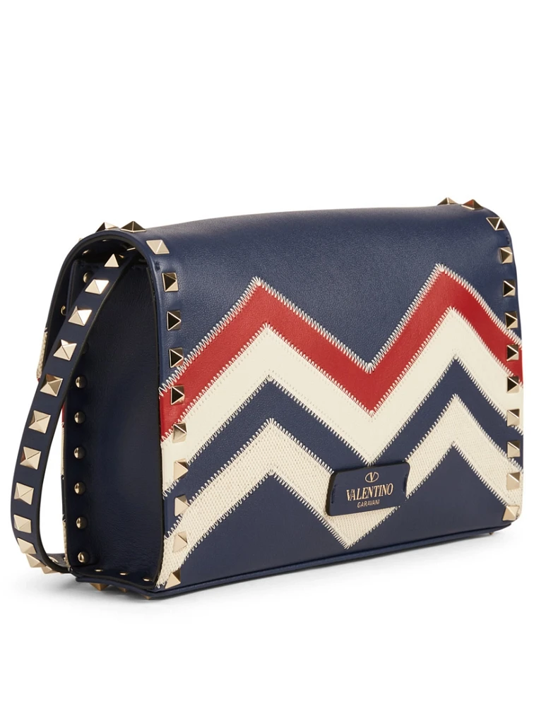 Medium Rockstud Leather Crossbody Bag In Chevron