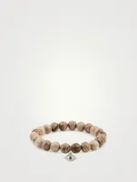 Beaded Bracelet With 14K White Gold Large Diamond And Sapphire Evil Eye Charm