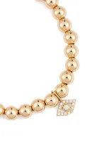 14K Gold Beaded Bracelet With Large Bezel Diamond Evil Eye Charm