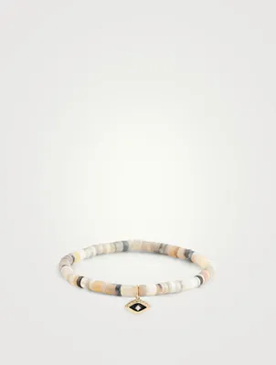 Beaded Bracelet With 14K Gold Diamond Evil Eye Charm