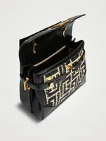 B-Buzz 23 Monogram Raffia Top Handle Bag