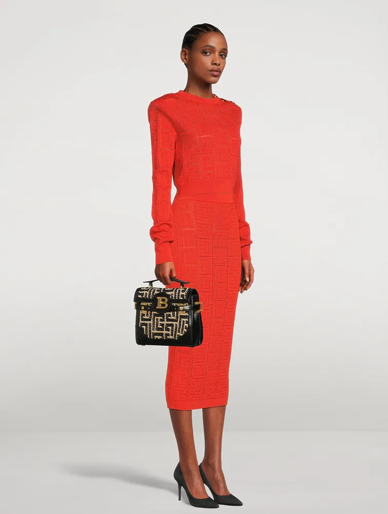 B-Buzz 23 Monogram Raffia Top Handle Bag