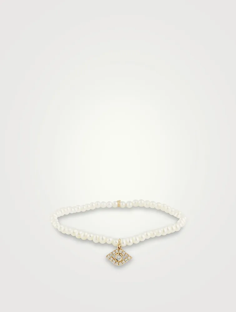 Pearl Bracelet With Large 14K Gold Diamond Evil Eye Charm