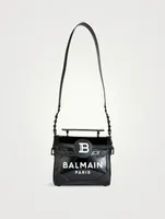 B-Buzz 23 Vinyl And Leather Top Handle Bag
