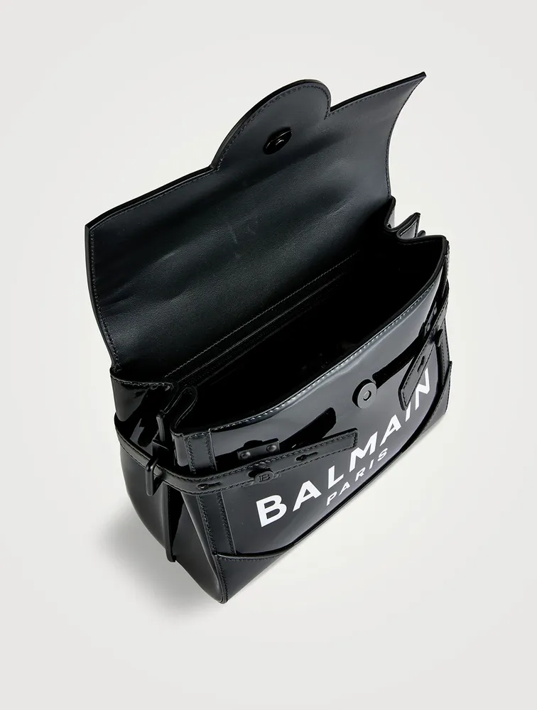 B-Buzz 23 Vinyl And Leather Top Handle Bag