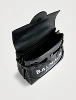 B-Buzz 23 Vinyl And Leather Top Handle Bag